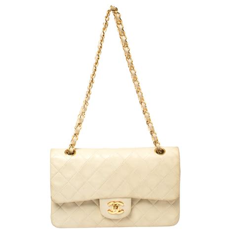 chanel cream clutfh|Chanel quilted bag.